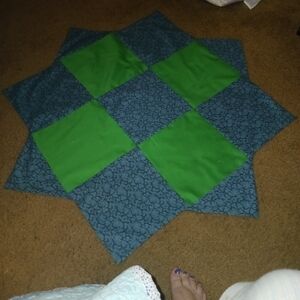 Homemade quilted table topper.